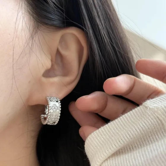 Van Cleef Arpels Perlee Clovers earrings Yellow gold with diamond accents rose gold with diamond accents silver-toned white gold with diamond accents 1 5cm hoop diameter