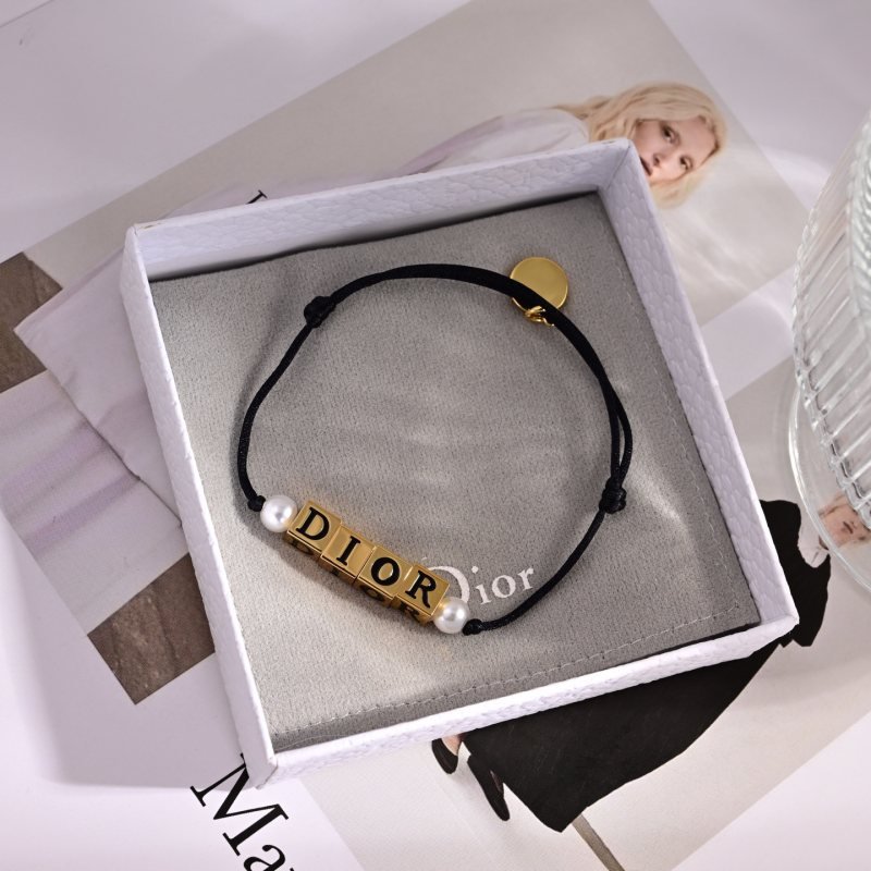 Dior D-Dice bracelet Black cotton cord gold-tone metal white resin pearl beads Adjustable sliding knot fits 15-19cm wrist