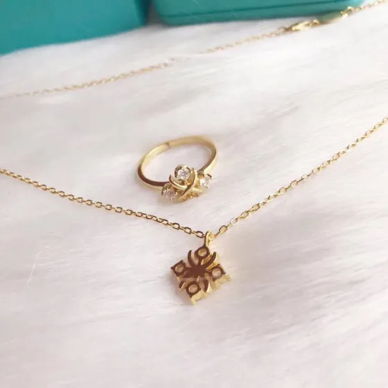 Tiffany Co Schlumberger Lynn necklace yellow gold with clear diamonds 16 inches