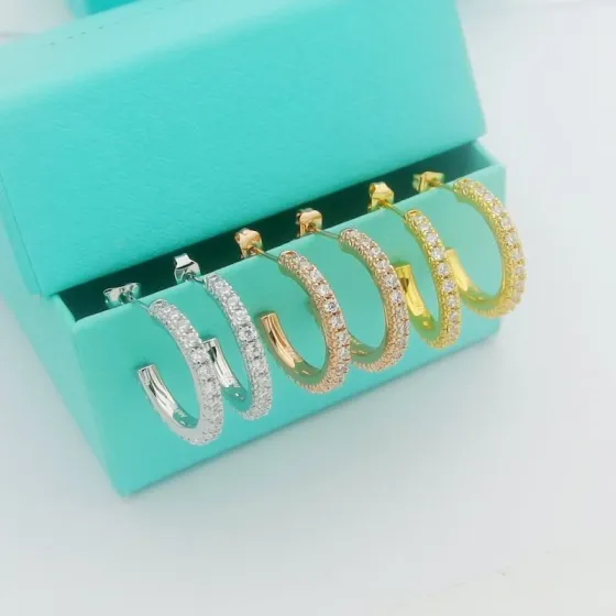 Tiffany T1 earrings 18k rose gold with pave set clear diamonds 15mm hoop diameter