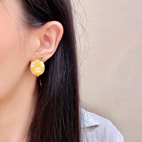 Chanel CC Lemon Fruit Stud Earrings earrings Gold tone metal yellow enamel lemon body white enamel CC logos green enamel leaves 1 5cm stud diameter