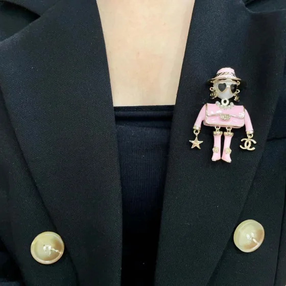 Chanel Coco Doll Brooch brooch gold-tone metal pink enamel white faux pearl black enamel clear crystal 4 5cm