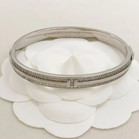 Tiffany Co T Two bracelet silver-toned metal with clear pave diamonds 17cm inner circumference