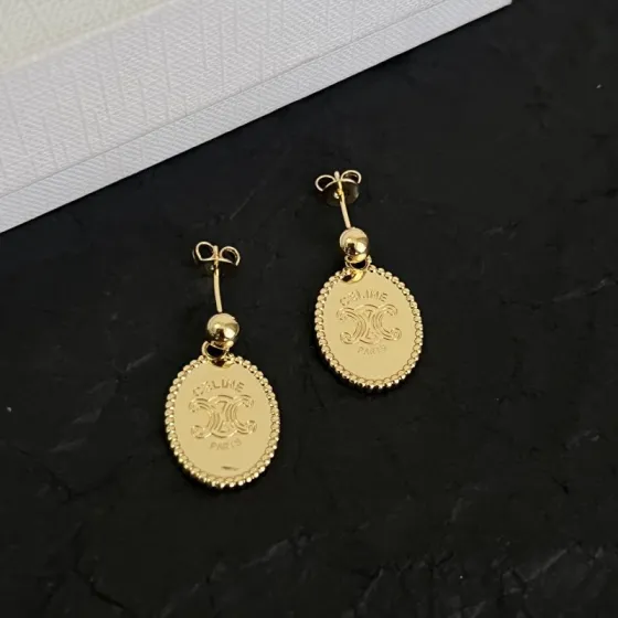Celine Triomphe Oval Medallion Drop Earrings earrings Gold-tone metal with engraved Triomphe logo no gemstones 2 5cm drop length