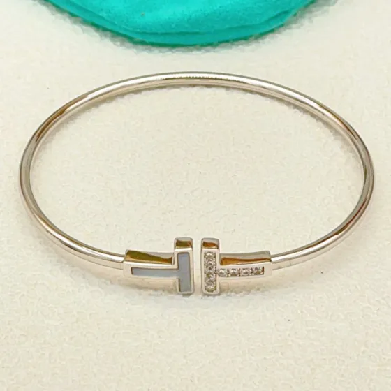 Tiffany Co T Wire bracelet 18k white gold with diamond and mother-of-pearl accents 17cm inner circumference