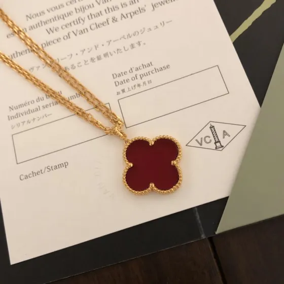 Van Cleef Arpels Magic Alhambra necklace 18k yellow gold with carnelian and malachite clover motifs 25mm pendant