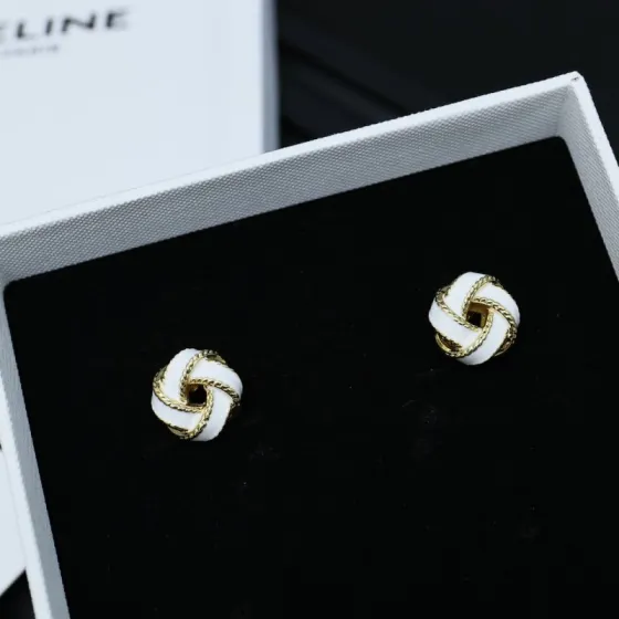 Celine PRECLOUS Knot Stud Earrings earrings gold-tone metal with white enamel 1 2cm stud diameter