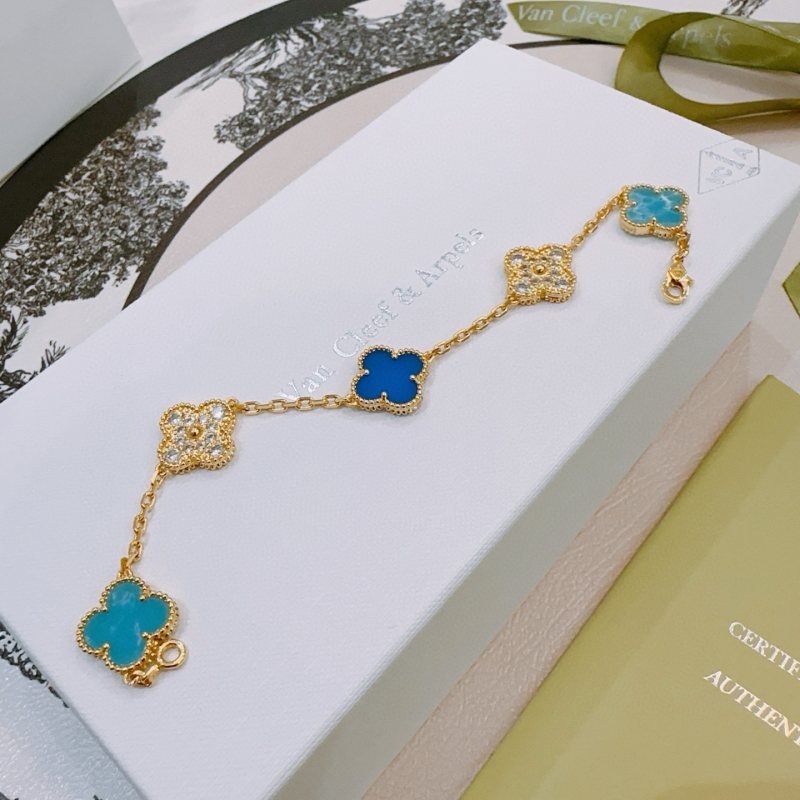 Van Cleef Arpels Alhambra bracelet Yellow gold with turquoise blue royal blue and clear diamond-accented clover motifs 18cm