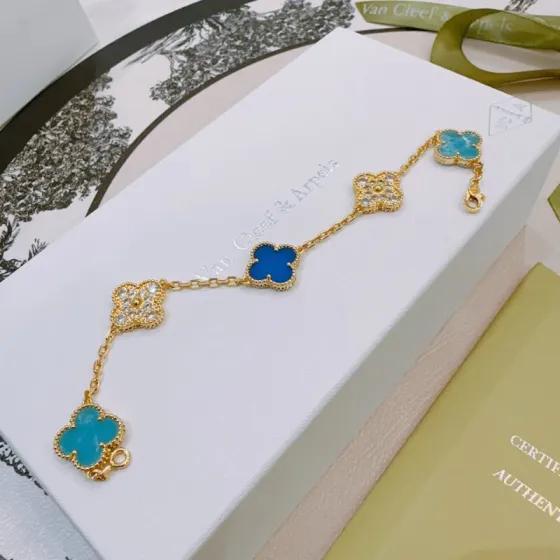 Van Cleef Arpels Alhambra bracelet Yellow gold with turquoise blue royal blue and clear diamond-accented clover motifs 18cm