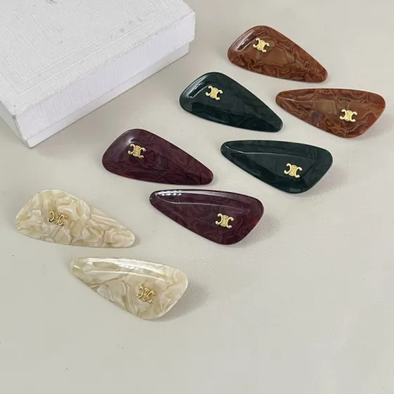 Celine Triomphe Marbled Acetate Hair Clip Set brooch Gold-tone metal with marbled acetate in brown tortoiseshell dark green burgundy and ivory cream 6cm per