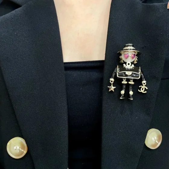 Chanel CC Logo Doll Robot Brooch brooch gold tone metal black enamel white faux pearl purple heart enamel white resin 4 5cm height