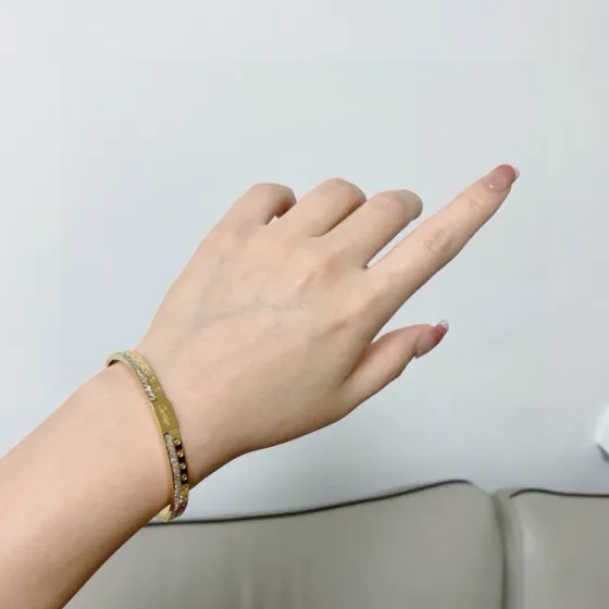 Cartier Love bracelet Yellow gold with clear diamond accents 17