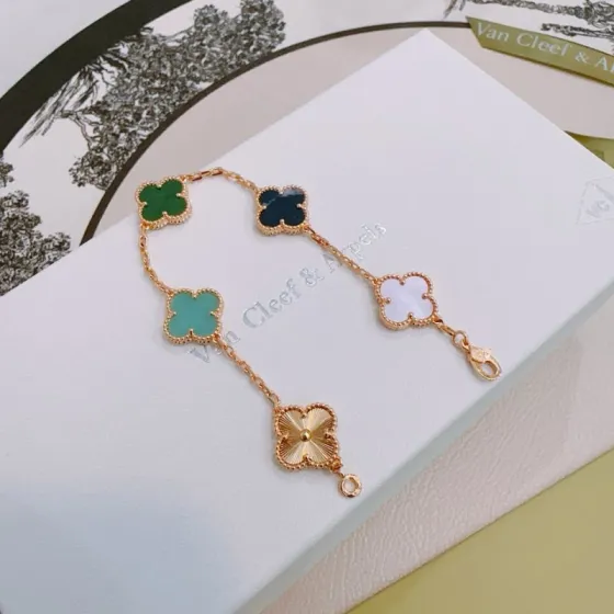 Van Cleef Arpels Alhambra bracelet Rose gold metal with green malachite dark blue stone turquoise white mother-of-pearl and guilloche rose gold clover motifs 19cm