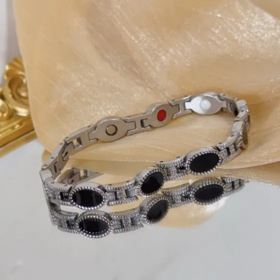 Piaget Magnetic Onyx Link Bracelet bracelet Silver-toned metal with black onyx inlays accented with red and white magnetic element details 19cm