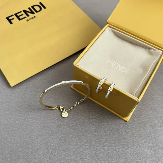 Fendi FF Logo Enamel Bangle Hoop Earrings Set bracelet earrings Gold-tone metal with white and black enamel accents One size bangle inner diameter 6cm hoop earring diameter 1 5cm