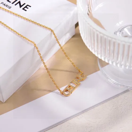Celine PRECIOUS Celine Logo Crystal Necklace necklace 18k gold tone metal with clear crystal accents 40cm with 5cm extender
