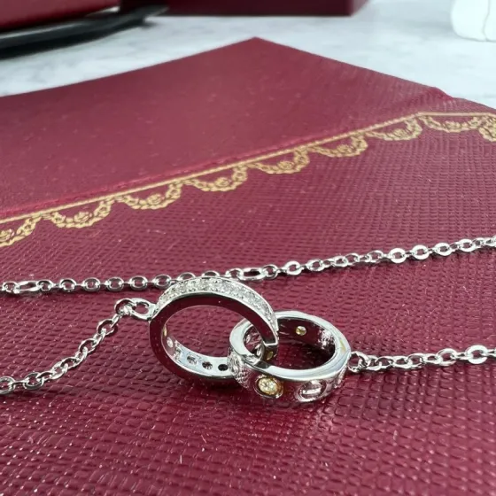 Cartier Love necklace silver-toned white gold with clear diamonds and yellow gold accent stones 42cm