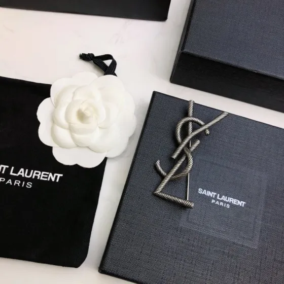 Saint Laurent Cassandre Twisted Monogram Brooch brooch antique silver-toned metal no gemstones 4 5cm