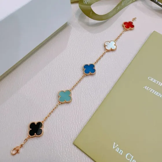Van Cleef Arpels Alhambra bracelet Rose gold metal with red carnelian white mother-of-pearl blue agate turquoise black onyx clover motifs 18cm