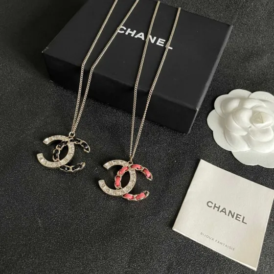 Chanel CC Logo Chain Woven Crystal Pendant Necklace necklace Light gold-tone metal with clear crystals and pink leather chain detailing 42cm
