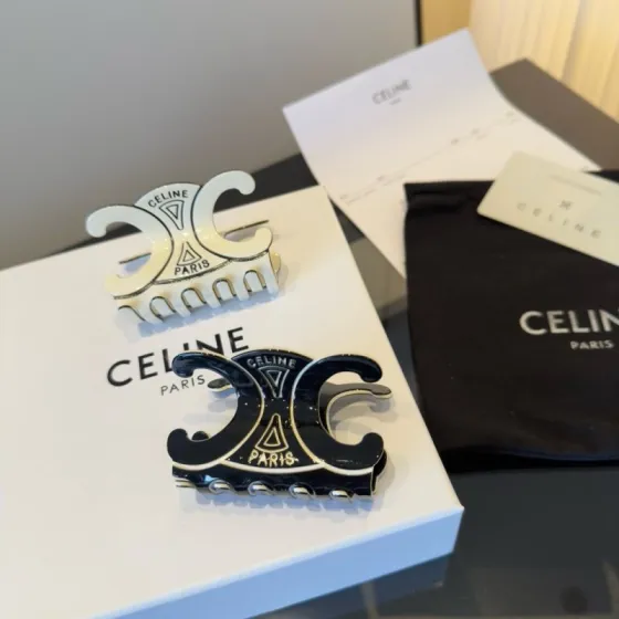 Celine Triomphe Paris Hair Claw brooch Black enamel with gold-tone metal accents Ivory enamel with gold-tone metal accents 6cm