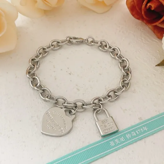 Tiffany Co Return to Tiffany Heart Tag Lock Charm bracelet sterling silver 7 inches