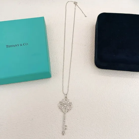 Tiffany Co Tiffany Keys Victoria Key Pendant necklace sterling silver with clear diamond-like gemstones 18 inch adjustable chain
