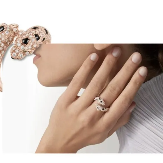 Cartier Panthere de Cartier ring 18K rose gold 18K yellow gold 18K white gold colorless diamonds black onyx tsavorite garnet US 7