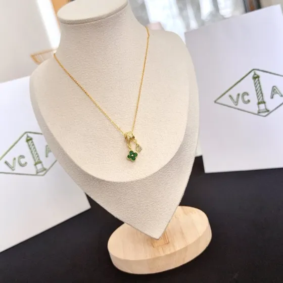 Van Cleef Arpels Alhambra Lucky Clover Pendant Necklace necklace Yellow gold metal with green gemstone clover and clear diamond accents 42cm
