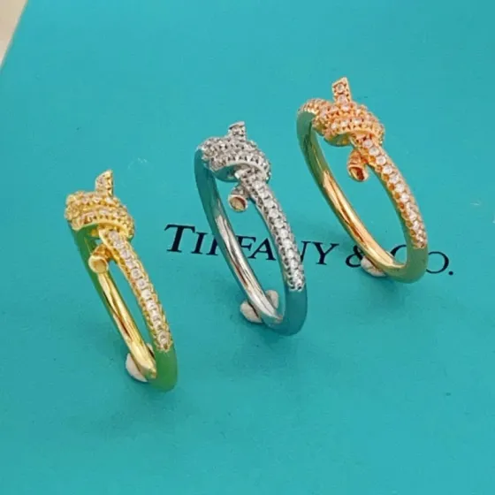 Tiffany Co Tiffany Knot ring 18k yellow gold with clear diamonds 18k white gold with clear diamonds 18k rose gold with clear diamonds US 6