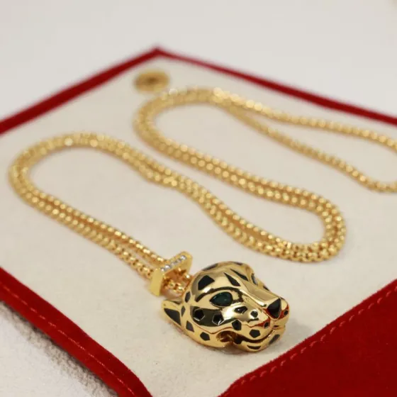 Cartier Panthere de Cartier necklace 18k yellow gold black lacquer green tsavorite garnet diamond accents 42cm