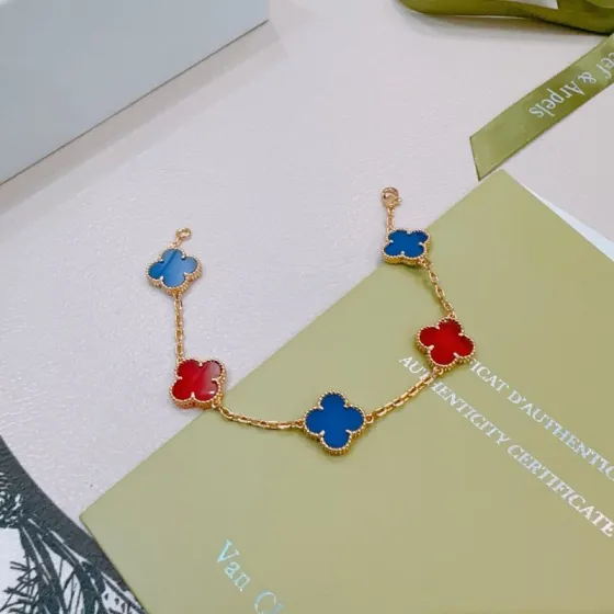 Van Cleef Arpels Alhambra bracelet Rose gold metal with blue agate and red carnelian clover motifs 17cm