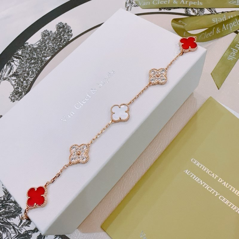 Van Cleef Arpels Alhambra bracelet Rose gold metal with red carnelian white mother-of-pearl and clear diamond accents 19cm