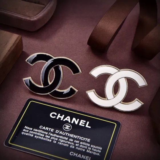 Chanel CC Logo Enamel Brooch brooch Gold-tone metal with black enamel and white enamel options 4 5cm width