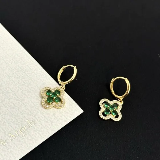 Van Cleef Arpels Alhambra earrings yellow gold metal with emerald green gemstones and clear diamond accents 12mm hoop diameter 10mm charm