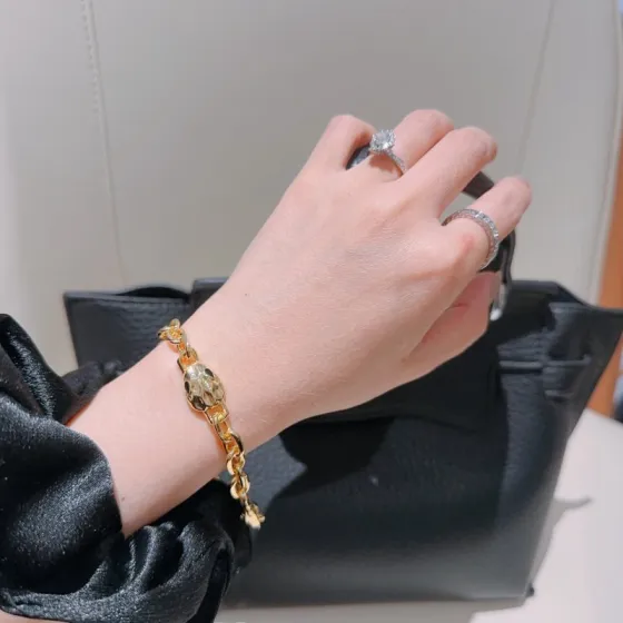 Bvlgari Serpenti bracelet 18k yellow gold with black enamel accents 18cm