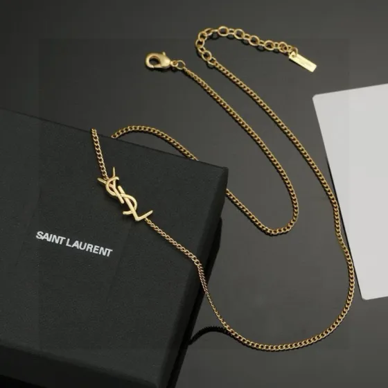 Saint Laurent Cassandre YSL Monogram necklace gold-tone metal no gemstones 45cm with 5cm extender