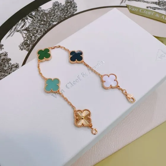Van Cleef Arpels Alhambra bracelet Rose gold metal with green malachite dark blue stone turquoise white mother-of-pearl and guilloche rose gold clover motifs 18cm