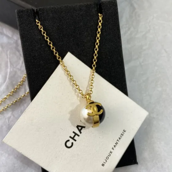 Chanel CC Logo Pearl Resin Ball Pendant Necklace necklace gold tone metal white faux pearl black resin 42cm with 5cm extender