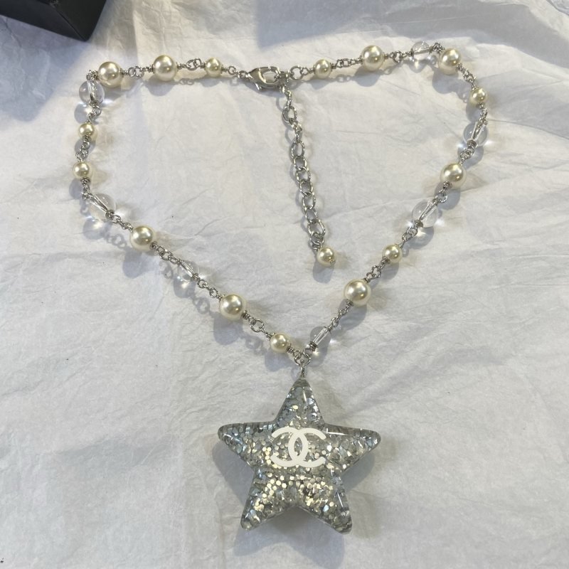 Chanel CC Glitter Star Pendant necklace Silver-tone metal cream faux pearl clear resin with silver glitter white CC logo 42cm with 5cm extender chain