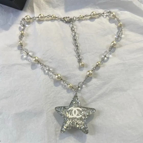 Chanel CC Glitter Star Pendant necklace Silver-tone metal cream faux pearl clear resin with silver glitter white CC logo 42cm with 5cm extender chain