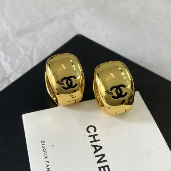 Chanel CC Logo Dome Clip-On Earrings earrings Polished gold-tone metal with black enamel CC logo One Size
