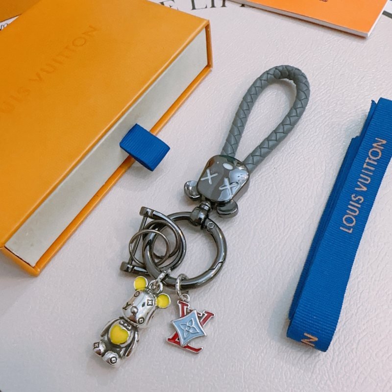 Louis Vuitton Anger Forest Bear Keychain Charm pendant Gunmetal gray hardware gray braided leather strap silver-tone bear charm with yellow enamel accents red and light blue enamel LV monogram charm 12cm total length