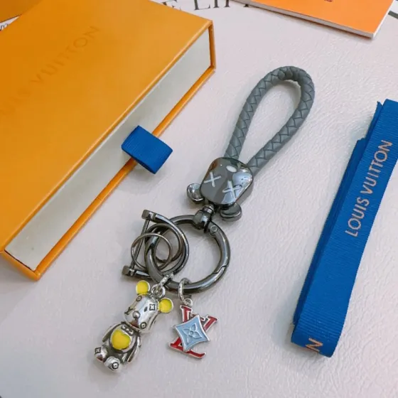 Louis Vuitton Anger Forest Bear Keychain Charm pendant Gunmetal gray hardware gray braided leather strap silver-tone bear charm with yellow enamel accents red and light blue enamel LV monogram charm 12cm total length