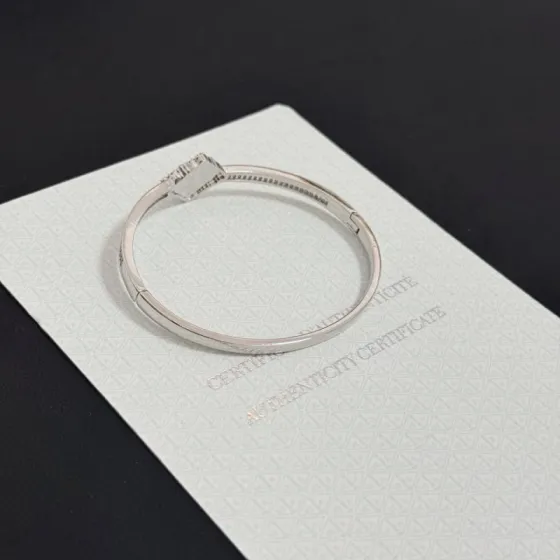 Van Cleef Arpels Alhambra bracelet silver-toned metal green enamel clear diamonds 17cm