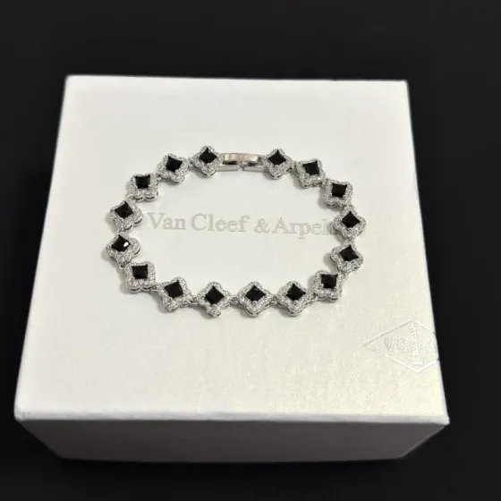Van Cleef Arpels Alhambra bracelet silver-toned white gold metal black onyx stones white diamond accents 17cm