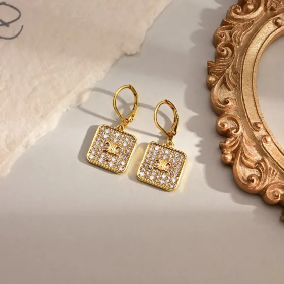 Celine Triomphe Nightfall earrings Gold-tone metal with clear crystal pave One Size