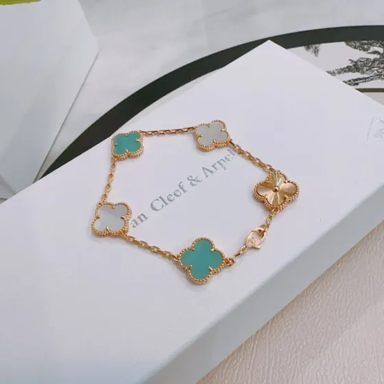 Van Cleef Arpels Alhambra bracelet Rose gold metal with turquoise blue white mother-of-pearl and guilloche rose gold four-leaf clover motifs 18cm