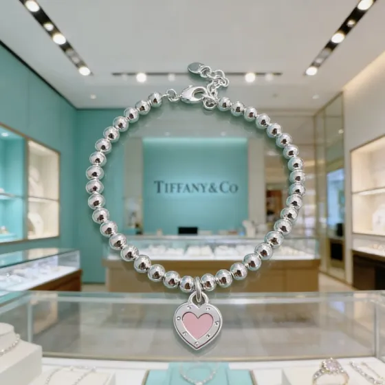 Tiffany Co Return to Tiffany Heart Tag Bead Bracelet bracelet Silver metal with pink white enamel heart charm 17cm
