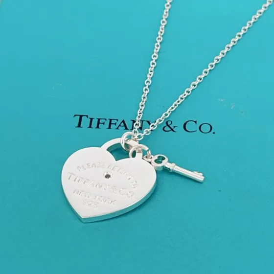 Tiffany Co Return to Tiffany Heart Tag with Key necklace Sterling silver with small clear diamond accent 18 inches